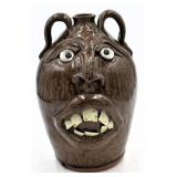 Mike Hanning Double Handled Brown Face Jug