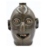 Reggie Meaders Folk Art Pottery Face Jug