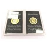 2 1974 Encased Eisenhower Proof Dollar Coins