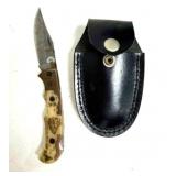 Damascus Folding Knife with Custom Grip