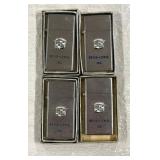 Four NOS Barlow Cadillac Lighters