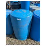 Three Blue Plastic Drums