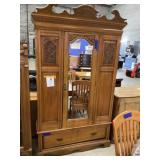 Wooden cabinet with mirror