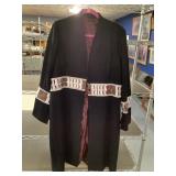 knee length coat with decorative woven design