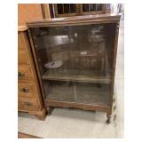 Tuscan bookcase with sliding glass doors