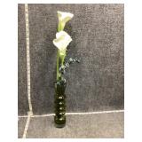 Vase with artificial flowers