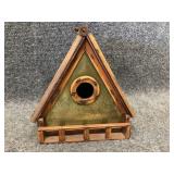 handmade rustic wooden birdhouse