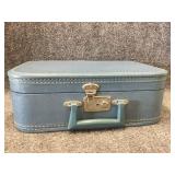 vintage light-blue hardshell Suitcase