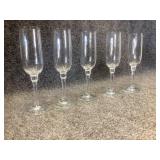 clear glass champagne flutes