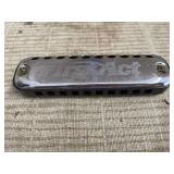 Vintage First Act Harmonica