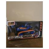 New Bright RC Dirt Trax Stunt Vehicle