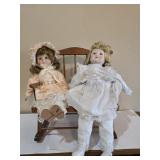 Pair of Porcelain Dolls & Wooden Rocking Bench