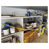 Contents of Shelves and floor on left side of bldg.