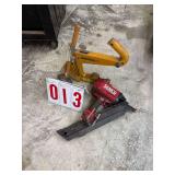 Bostitch hardwood floor nailer, Senco airgun, and hammer