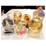 Seven Musical Snow Globes