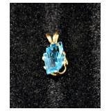 14K Gold Pendant With Blue Topaz Stone