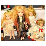 Four Collectible Porcelain Dolls