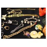 Jewelry Lot With Chains, Rings, And Pendants