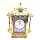 Gold gilt and enamel on metal clock