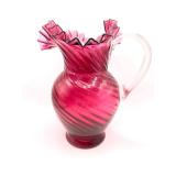 Red glass pitcher.