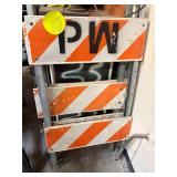 (2) traffic barricades, (2) plastic saw horses