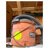 Rigid small shop vac., no wheels.