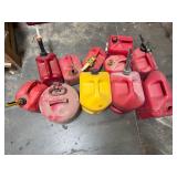 (11) gerry cans, fuel cans, (1) diesel can.