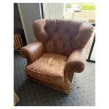 Leather wing back chair, brown.