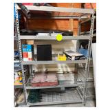 Shelving unit with contents, wire fencing, darts