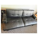 Futon, black.  This is banged up a bit.