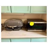 Microwave and NextGrill propane grill