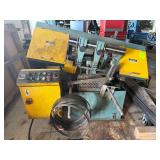 Horizontal band saw with roller stand and blades