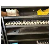 CNC brackets.  100s of them in this lot.