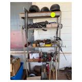 Shelf with contents, (3) helmets, several clamps,