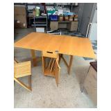 Dining table with chair storage underneath