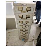 White metal file cabinet