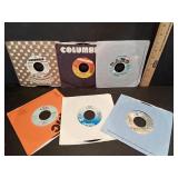 Six 45 RPM Vinyl Records