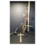 Potted Orchid, Crucifix, and Sculpture
