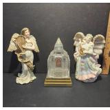 Two Angel Figurines and Lighted Church