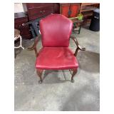 Red armchair, leather