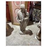 Concrete statue of a Saint