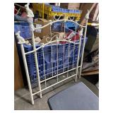 Twin iron bed with rabbit tops