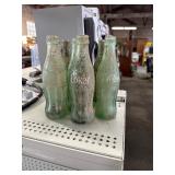 Lot of eight Coca-Cola bottles 6 1/2 ounce