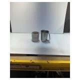 Two Cups: Metal Mug and Stoneware Canister