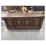 Vintage Hand Carved 4 Door Cabinet on Castors