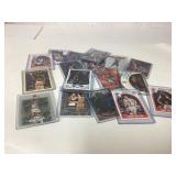 Basketball Cards Featuring Various Players in Plas
