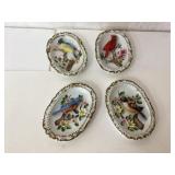 Four Decorative Ceramic Wall Plaques with Bird Mot