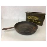 11-Inch Marked Cast Iron Skillet and Military Ammo 11-Inch Marked Cast Iron Skillet and Military Ammo