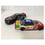 Two NASCAR Die-Cast Model Cars: Skittles and Dale Two NASCAR Die-Cast Model Cars: Skittles and Dale
