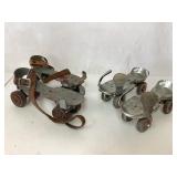 Two Pairs of Vintage Metal Skates with Adjustable Two Pairs of Vintage Metal Skates with Adjustable